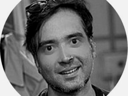 Portrait of a dark-haired man.