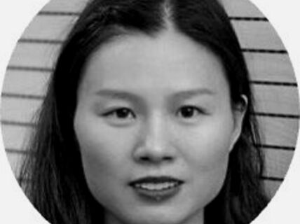 Portrait of a dark-haired woman.