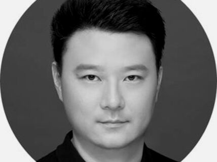 Portrait of a dark-haired man.