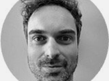 Portrait of a dark-haired man.