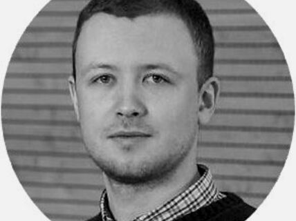 Portrait of a dark-haired man.