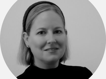 Portrait of a smiling woman.