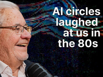Smiling elderly man with glasses at a microphone, abstract blue and red digital waves and text about AI in the 80s