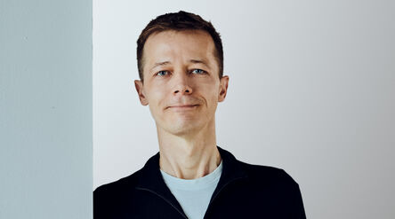 Portrait photo of person wearing dark shirt