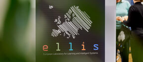 ELLIS logo with people standing off to the side in the background