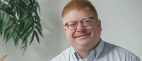 Photo of man in button-down shirt