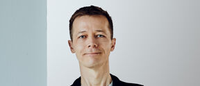Portrait photo of person wearing dark shirt