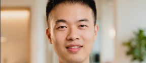 Portrait photo of man in light blue shirt